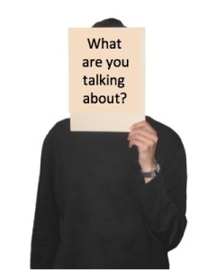 Man holding sign in front of face