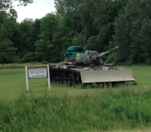 Tank with snow plow on front