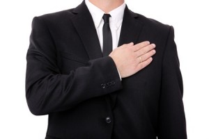 Businessman with hand over heart