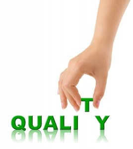 Hand building the word Quality