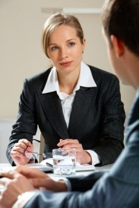 Female-leader-listening-to-male-co-worker