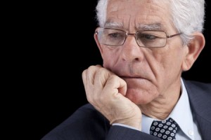 Older businessman deep in thought 
