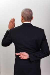 businessman-swearing-oath-with-fingers-crossed